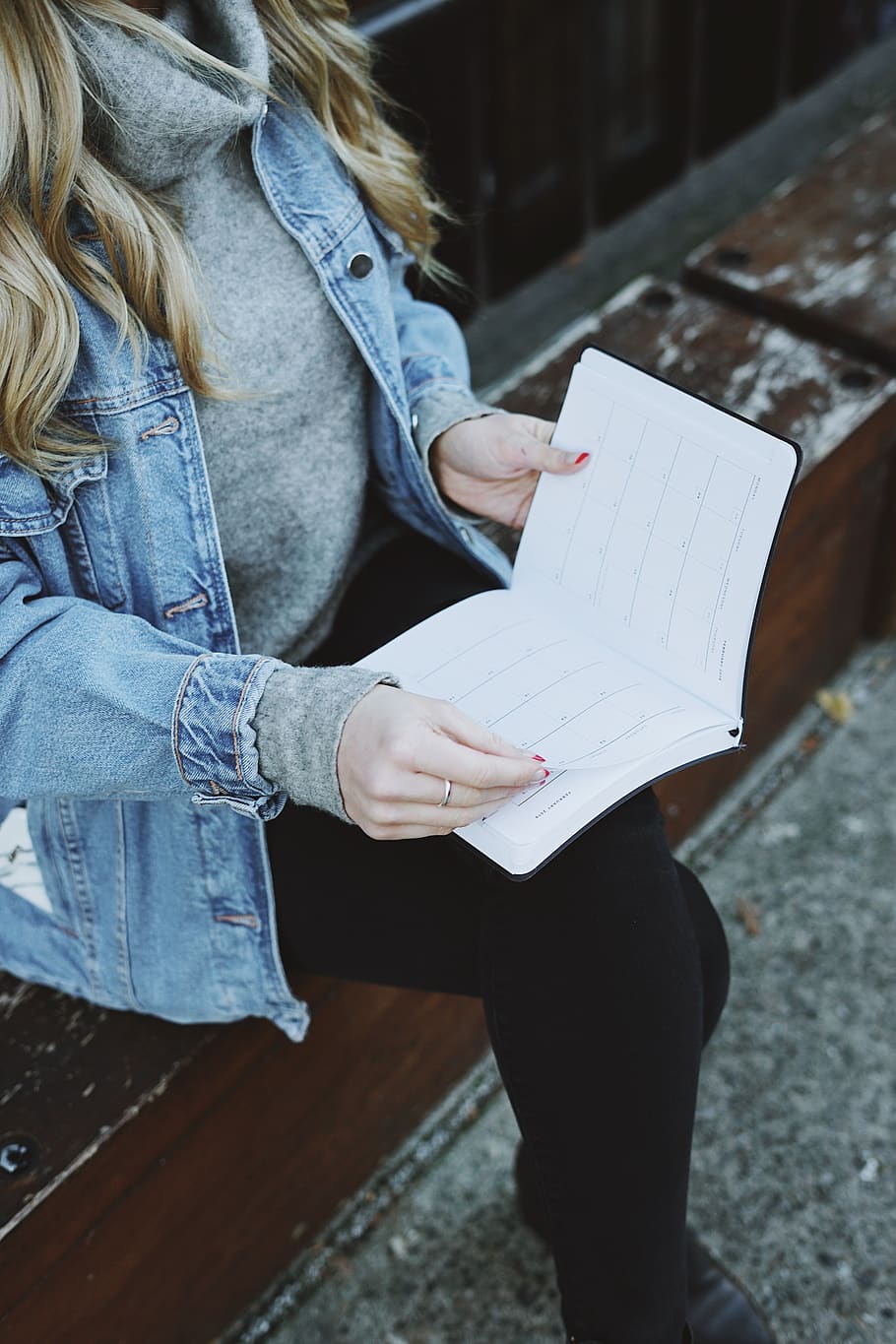 woman holding white notebook, pants, apparel, clothing, text HD wallpaper