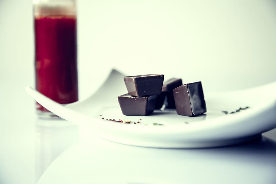 Chocolate Bars on White Ceramic Plate, chocolates, drinking glass HD wallpaper