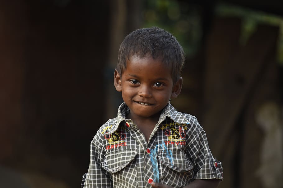 Boy Wearing White and Multicolored Collared Shirt in Selective Focus Photography HD wallpaper