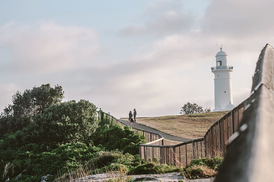 Two Person Standing Near White Lighthouse, architecture, building HD wallpaper