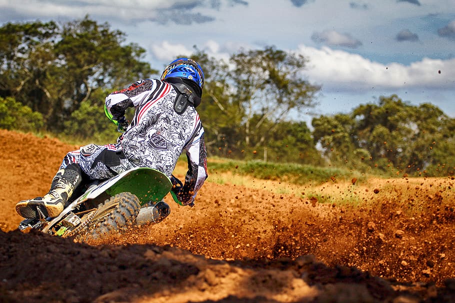 Man Riding Motocross Dirt Bike on Track, action, background, bike rider