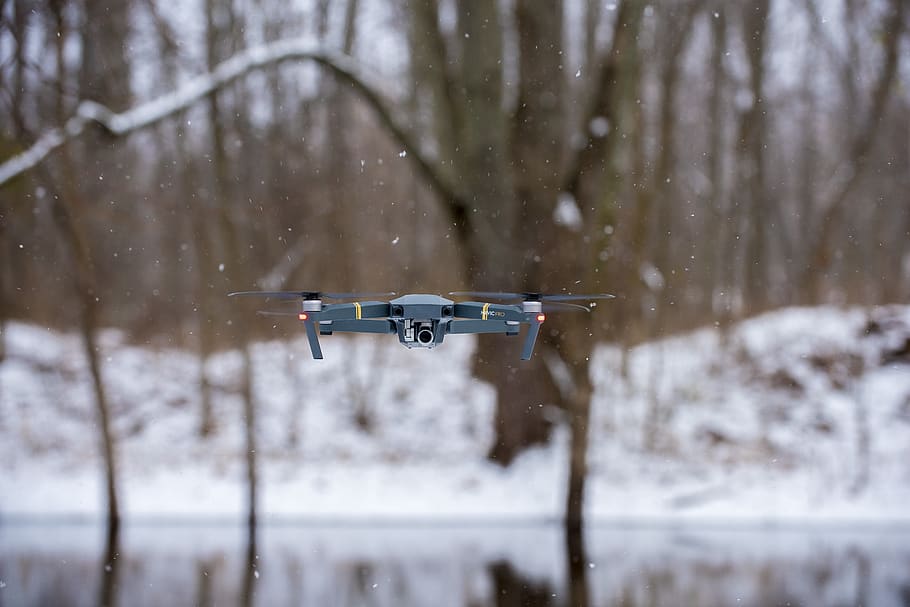 flying black drone during winter, camera, flght, hover, snow HD wallpaper