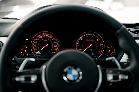 black-bmw-vehicle-steering-wheel-thumbna