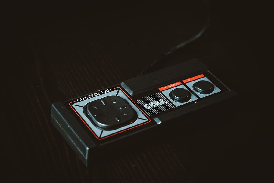 black Sega control pad, technology, indoors, close-up, time, wristwatch HD wallpaper