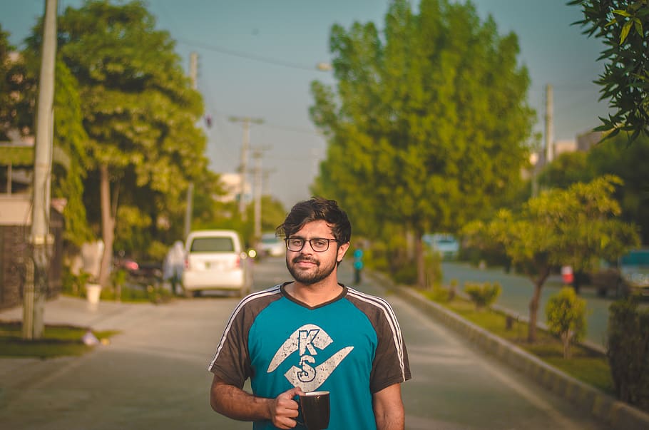 Man Standing on Road While Holding Black Ceramic Mug, cup, daylight HD wallpaper