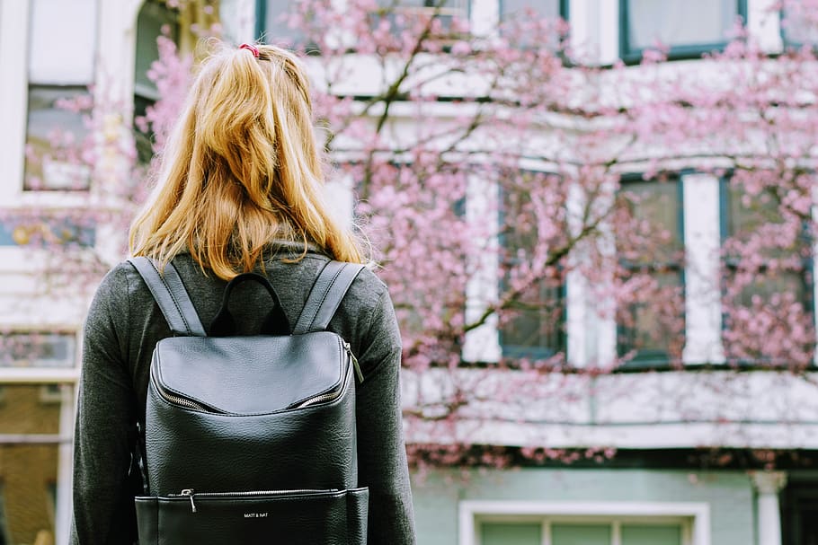 Woman Wearing Backpack Standing in Front Building, adult, back view HD wallpaper