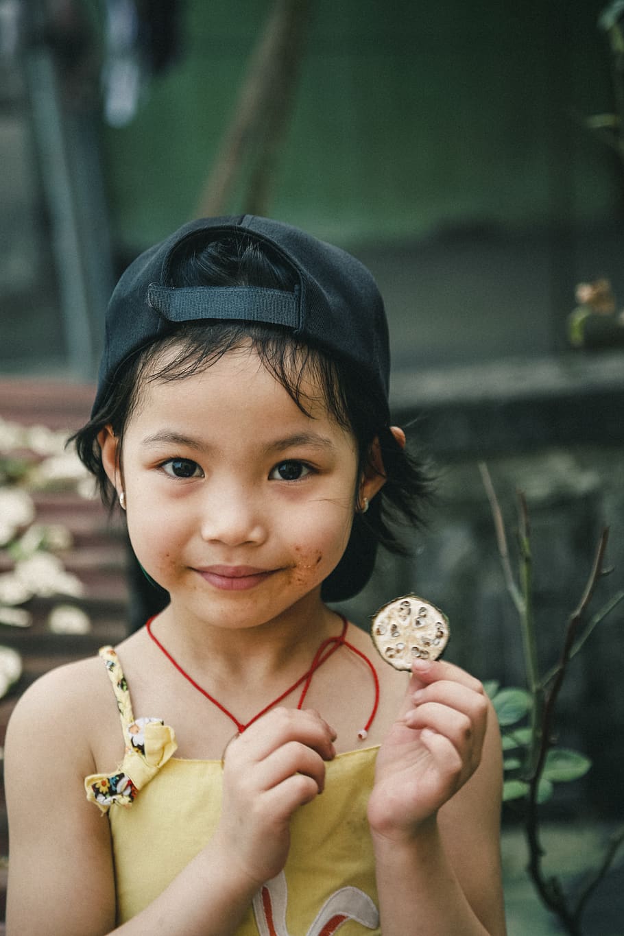 portrait-photography-of-girl-holding-rou