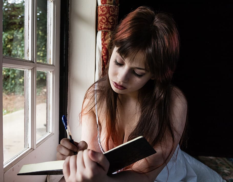 Woman Writing on Book, adolescent, adult, ballpen, beautiful, HD wallpaper