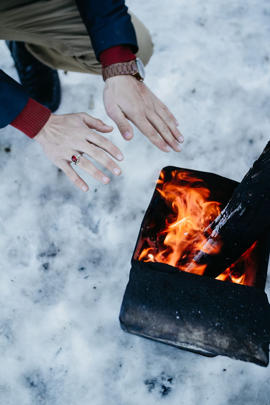 person warming hands on fire, human, flame, islamabad, pakistan HD wallpaper