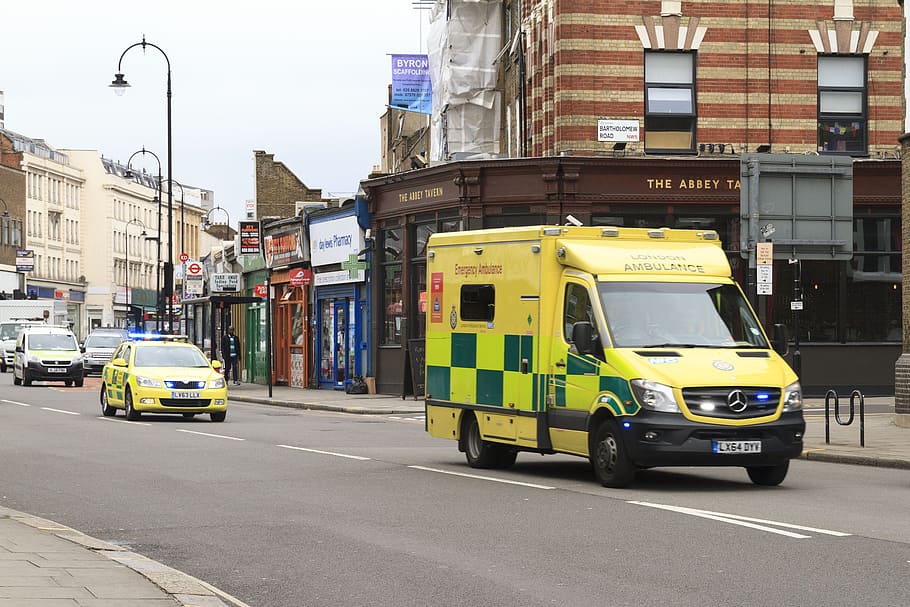 LONDON - AUGUST 21, 2017 Emergency Ambulance speeds along a street in London in response to an emergency call.