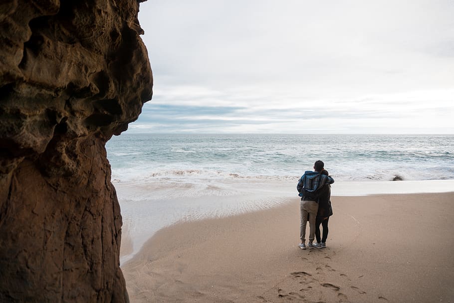 two person standing on seashore, nature, outdoors, human, ocean HD wallpaper