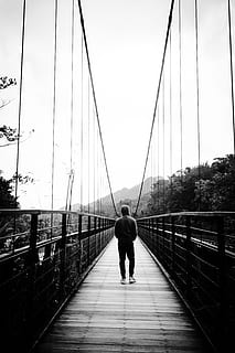 man, walking, bridge, black and white, people, travel, adventure HD wallpaper
