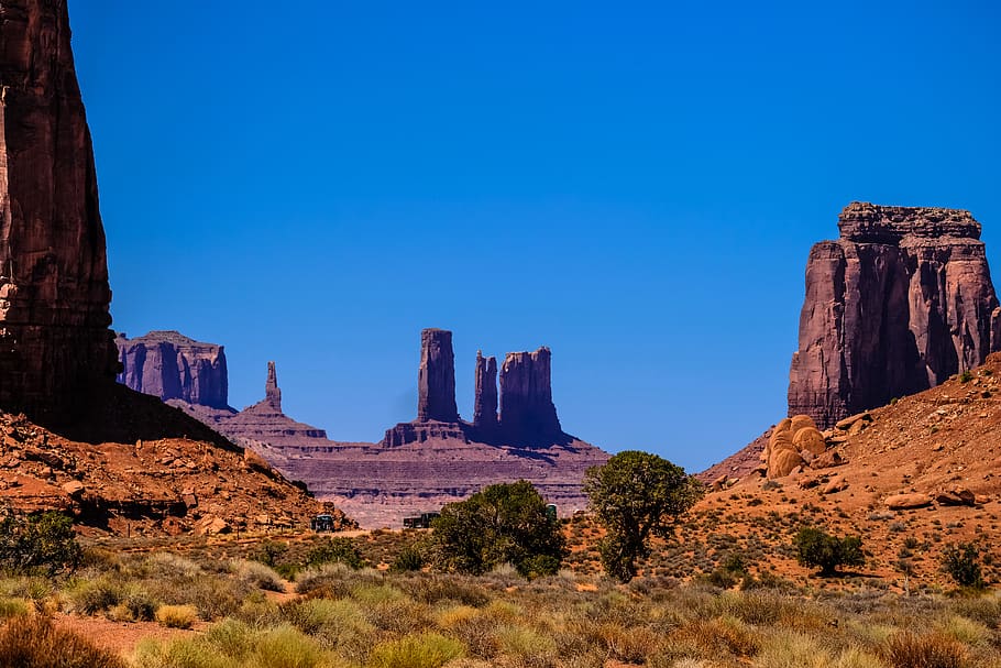 Аризона page. Sunny Desert Rock on the ground. Desert with Bushes.