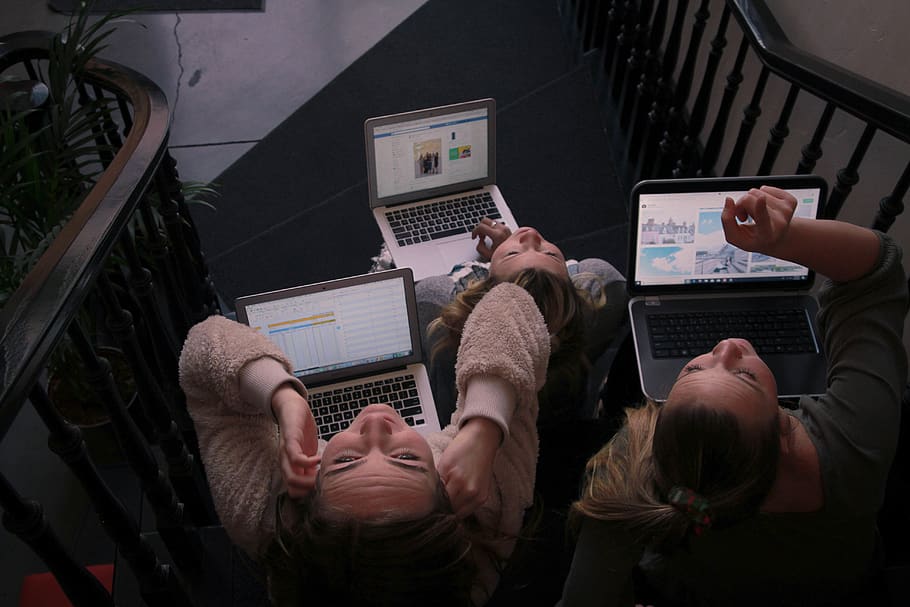 three person using laptops while sitting on ladder, technology HD wallpaper