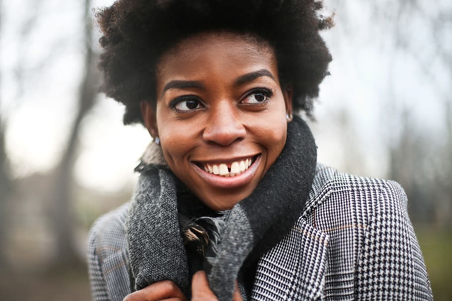 A young African woman with curly hair posing outdoors on winter day, HD wallpaper