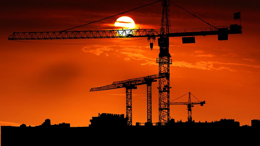 sunset, cranes, site, architecture, silhouettes, twilight, orange HD wallpaper