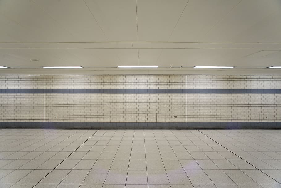 empty hall, tile, indoor, tunnel, wall, line, white, grey, gone