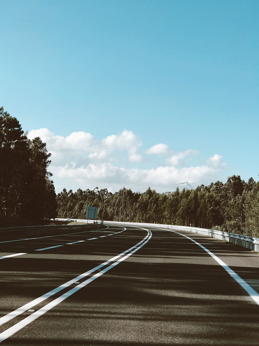 Empty Winding Road Under Blue Sky, asphalt, highway, tree, plant HD wallpaper