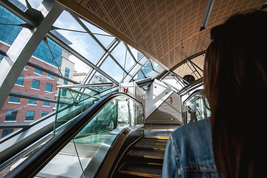 Woman on escalators at metro station, architecture, transportation HD wallpaper