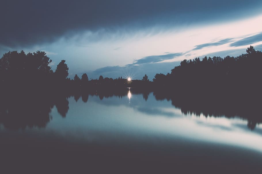 silhouette of trees under cloudy sky, lake, forest, flare, night HD wallpaper