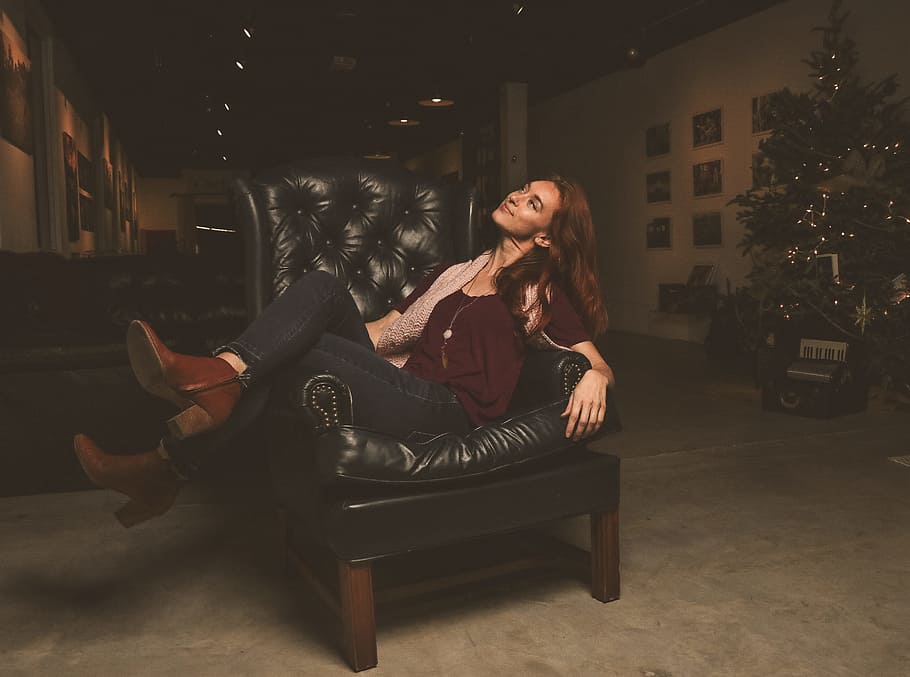 Woman Sitting on Black Leather Armchair, adult, beautiful, boots