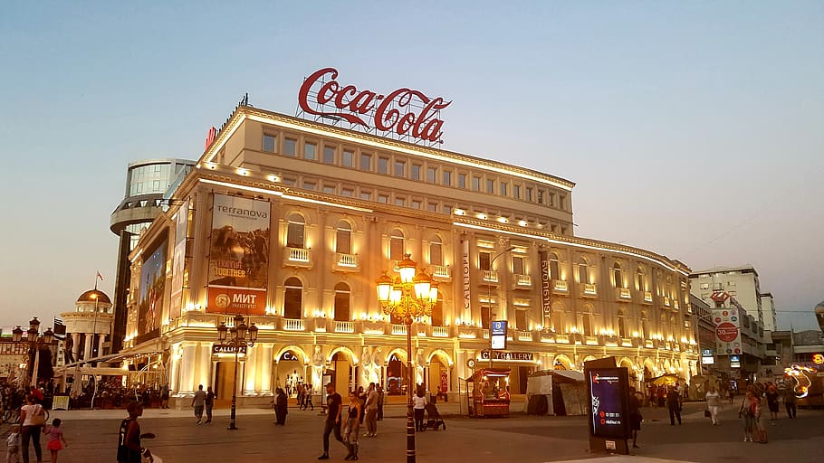 People Walking Near White Coca-cola Concrete Building, administration HD wallpaper