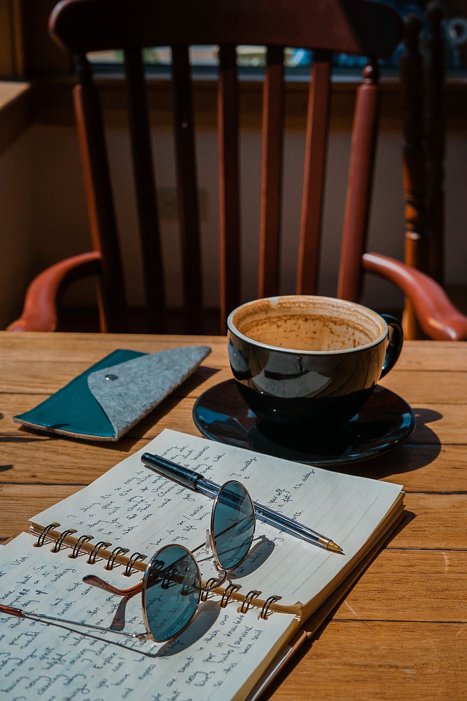 black ceramic mug beside notebook, table, cup, coffee cup, food and drink HD wallpaper