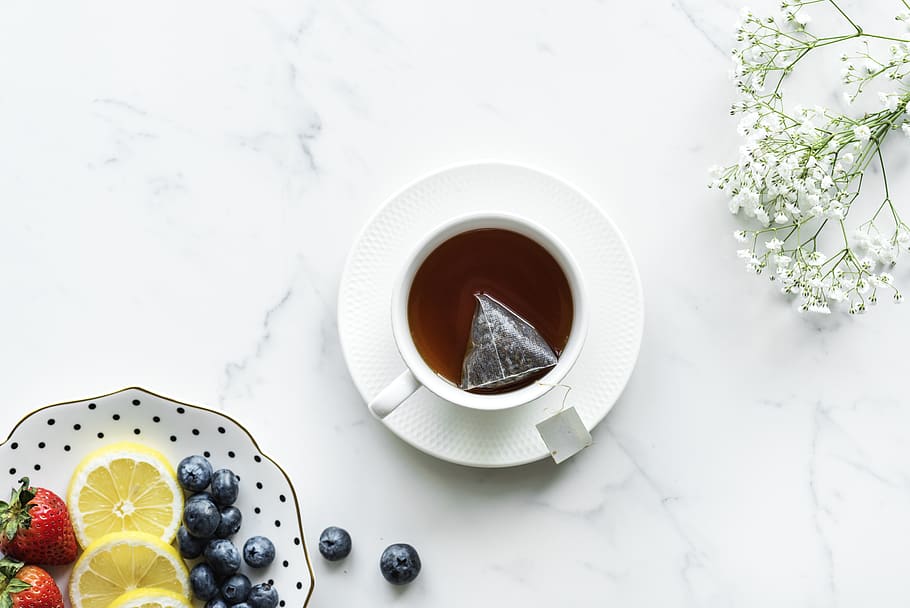 Flat Lay Photography of tea in White Teacup With Saucer, aerial HD wallpaper