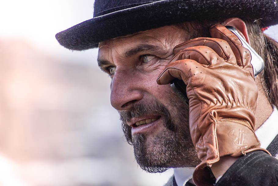 man, mobile phone, smartphone, gloves, beard, mustache, technology HD wallpaper