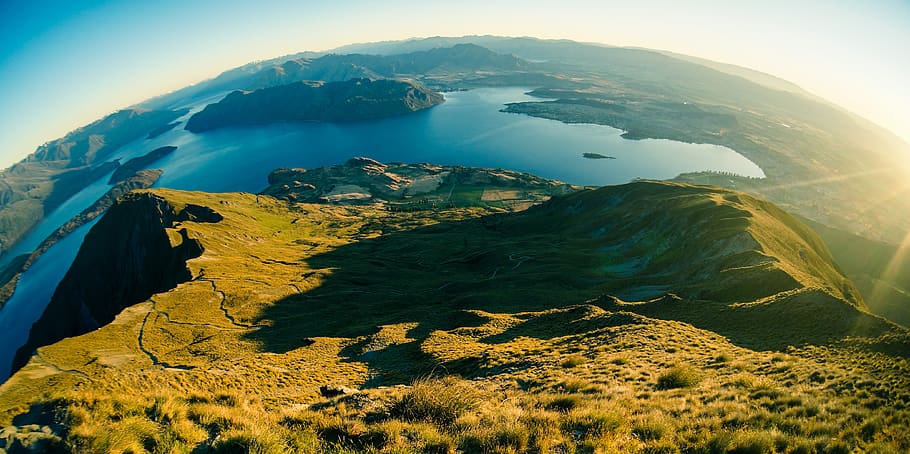 Aerial Photography of Mountain Near on Body of Water, clouds HD wallpaper