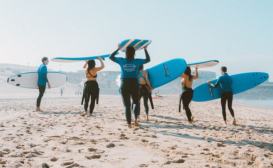 Group of People Carrying Surfboards, action, beach, blue, enjoyment HD wallpaper