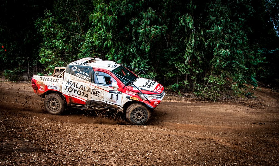 Red And White Toyota Car, action, drive, fast, gravel, hurry HD wallpaper