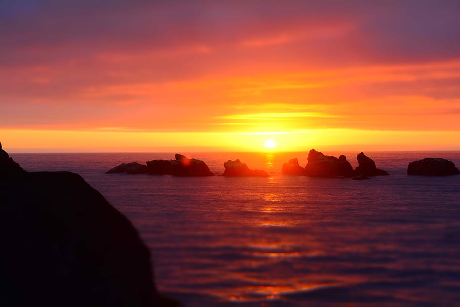 rocks on sea under sunset, sky, water, beauty in nature, scenics - nature HD wallpaper