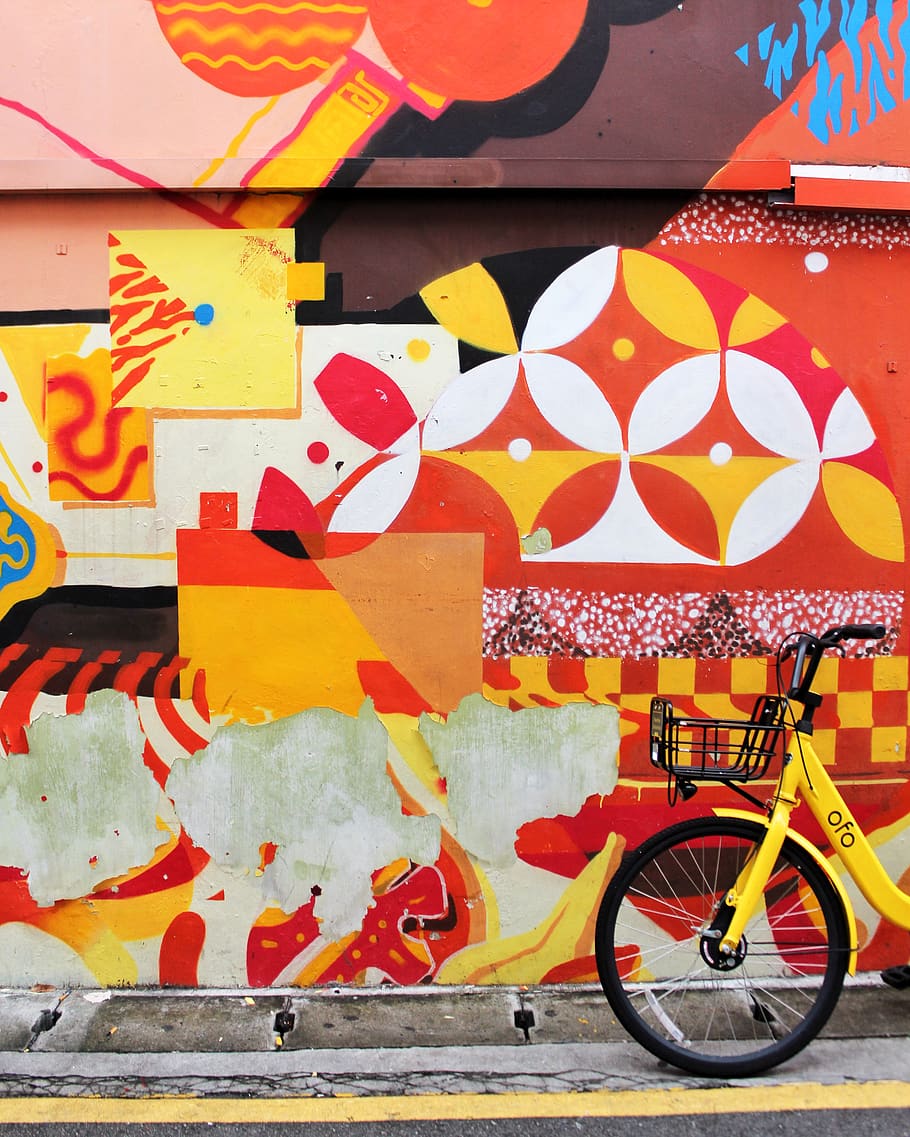 yellow city bike beside multicolored wall, wheel, machine, bicycle