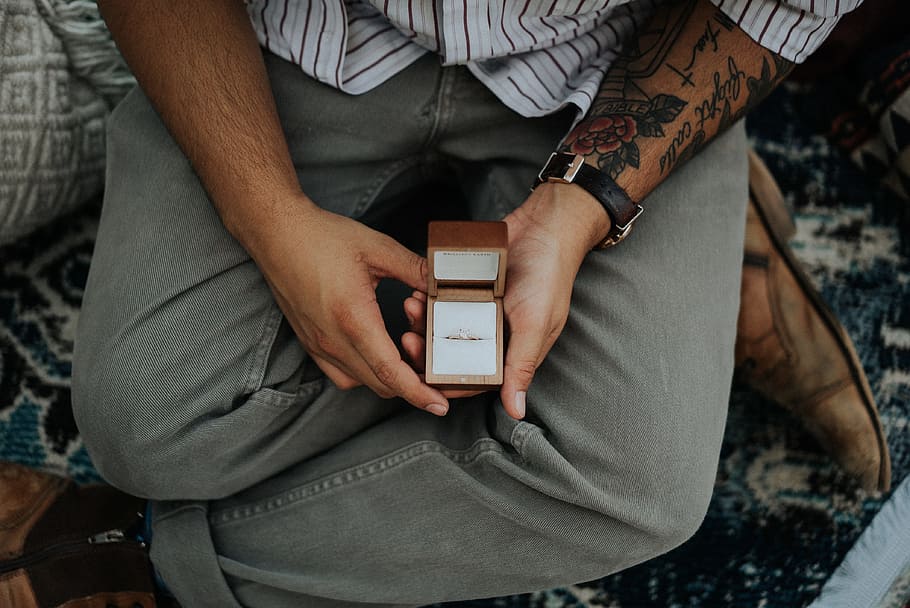 person holding opened brown ring box, engagenment, proposal, from above HD wallpaper
