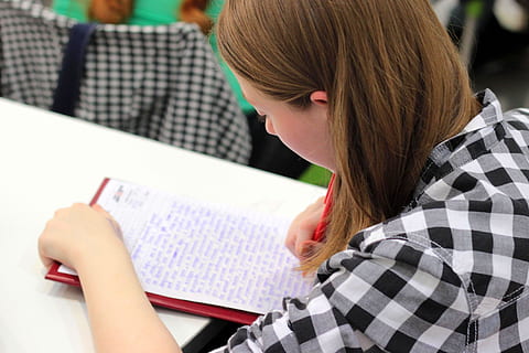 Woman Writing on Paper, education, homework, learning, pen, person HD wallpaper
