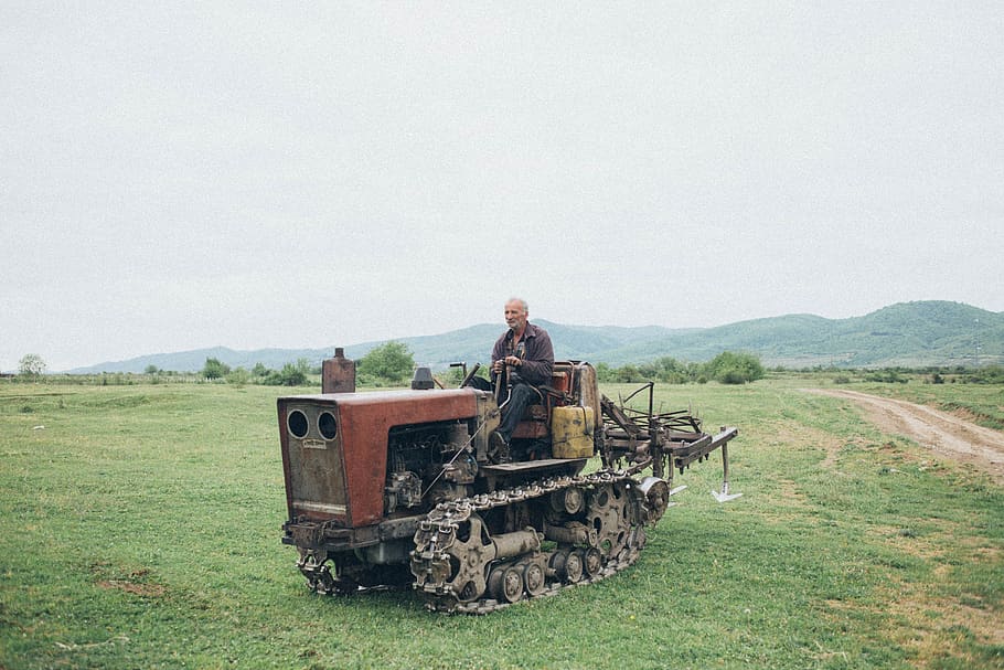 Man Riding Farm Equipment, daylight, field, grass, landscape HD wallpaper