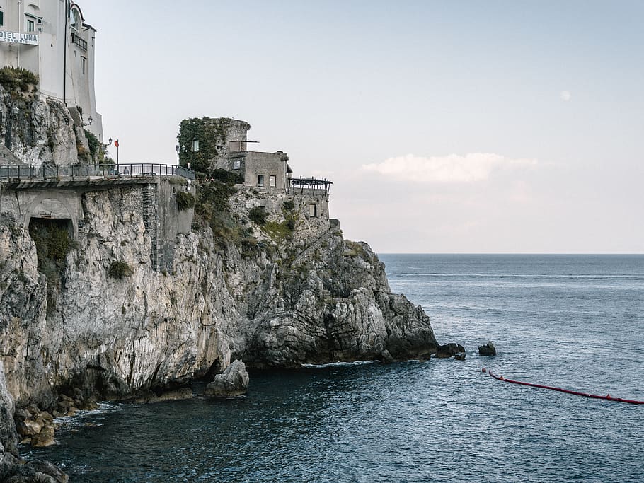 Concrete Building By The Sea, architecture, cliff, ocean, water HD wallpaper