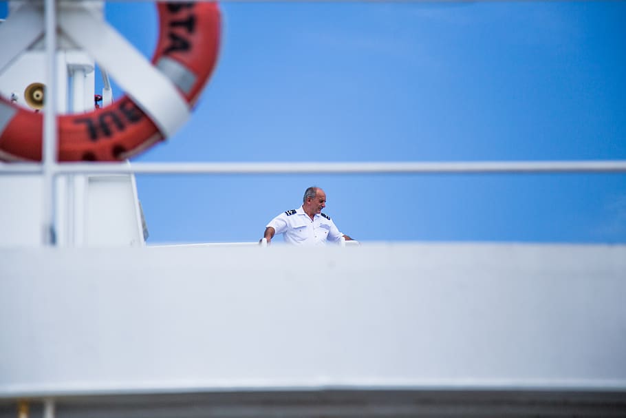 ship captain standing on top, human, person, people, boat, life buoy HD wallpaper