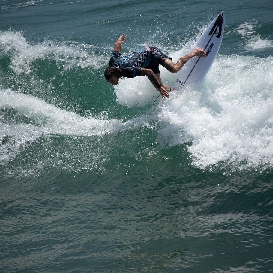 HD wallpaper: man riding surfboard on sea, water, motion, sport