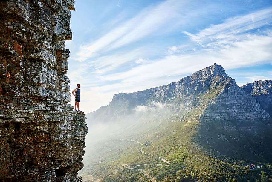 Man Standing on Cliff, adventure, beautiful, climb, daredevil, HD wallpaper