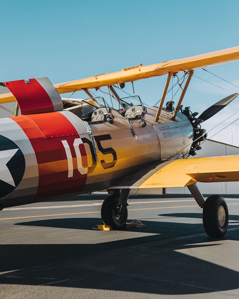 yellow, red, and white biplane, aircraft, transportation, airplane