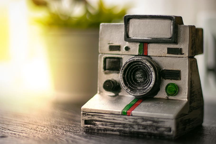 Photo of White Film Camera Miniature, antique, blur, blurred background HD wallpaper