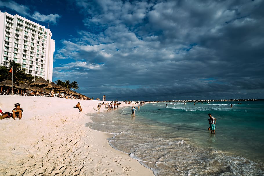 Photo of People On Seashore, beach, building, clouds, cloudy HD wallpaper