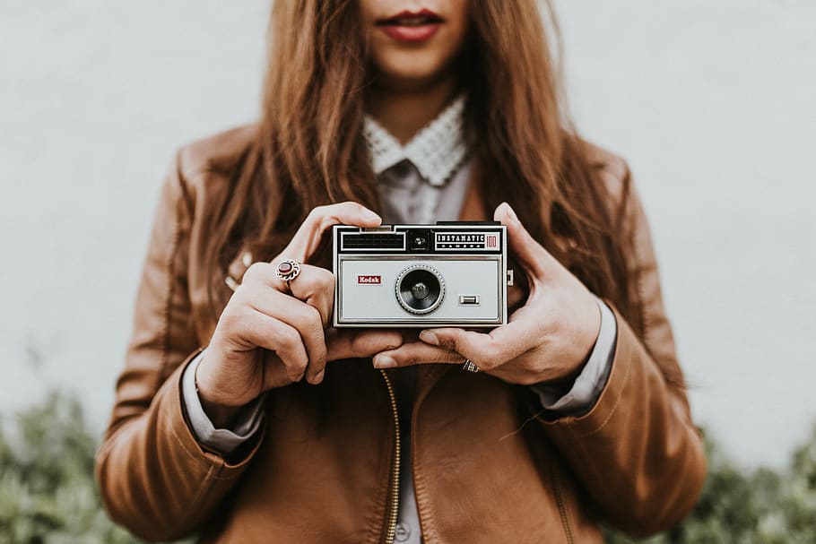 woman holding camera, photography themes, technology, one person HD wallpaper