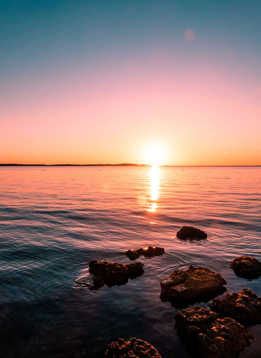 Rocks On Water, beach, croatia, dawn, dusk, horizon, nature, ocean HD wallpaper