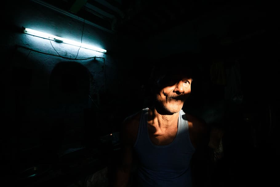 man with face being hit by light, person, human, india, night life HD wallpaper