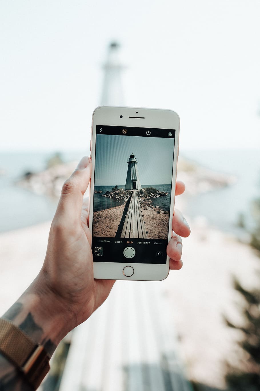 white lighthouse through phone, device, screen, iphone, taking photo, HD wallpaper