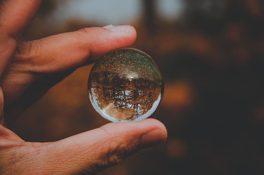 Person Holding Glass Ball, hand, macro, sphere, human hand, human body part HD wallpaper