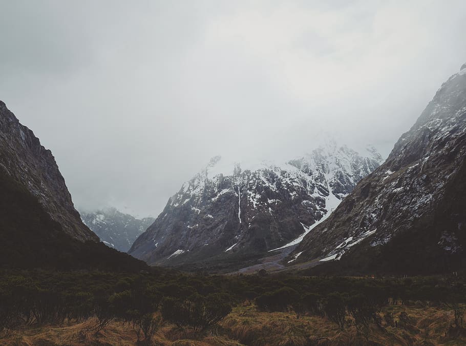 mountain covered with snow under cloudy sky, outdoors, nature HD wallpaper